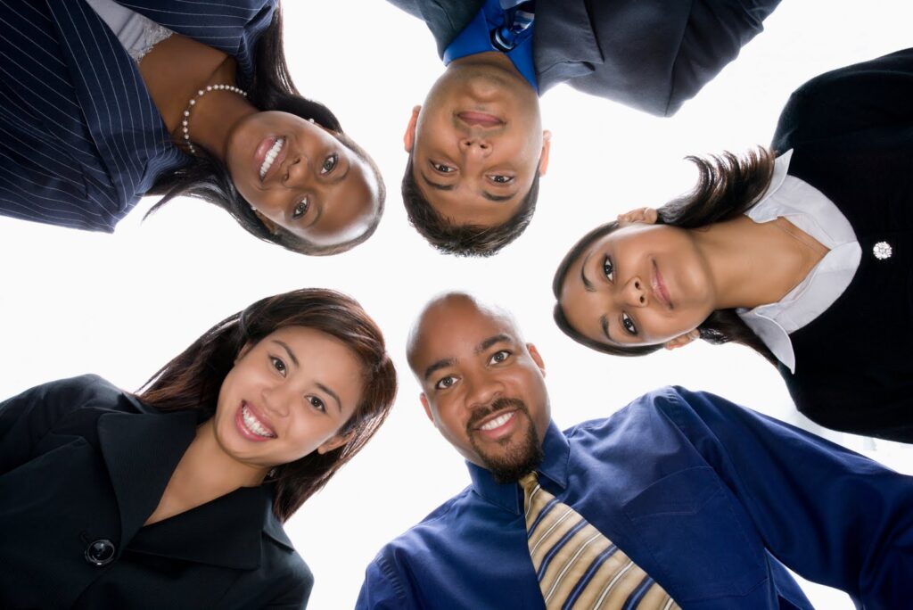 diverse business people in huddle.